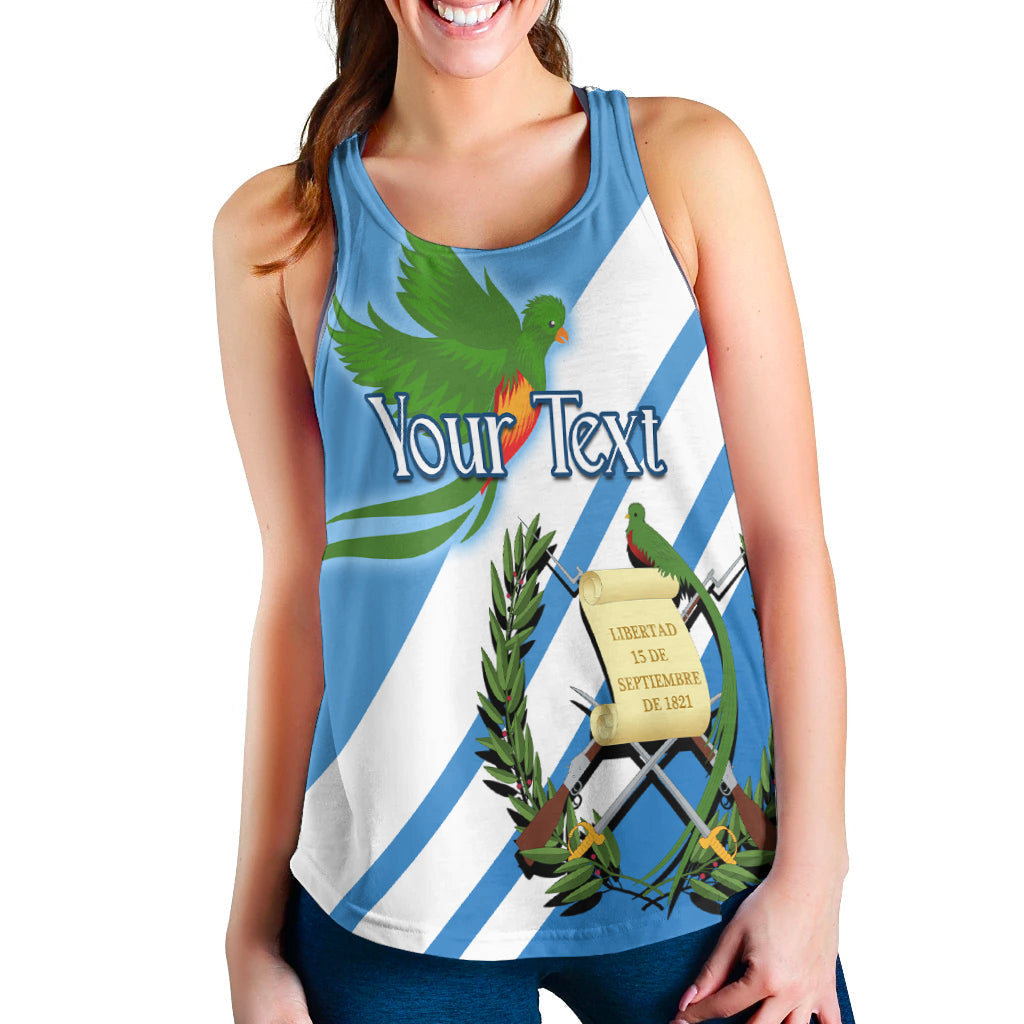 Blue women’s racerback tank with green quetzal and striped Guatemala flag graphic