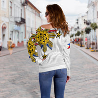 Women’s off-shoulder sweater, white with large yellow tribal sun and stars on back