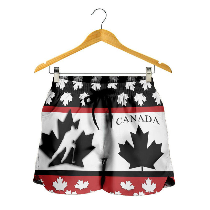 Hanging Canada women’s hockey shorts, white/red/black maple-leaf pattern, elastic waist