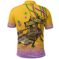 Yellow polo shirt with Mardi Gras back print, beads, and alligator art