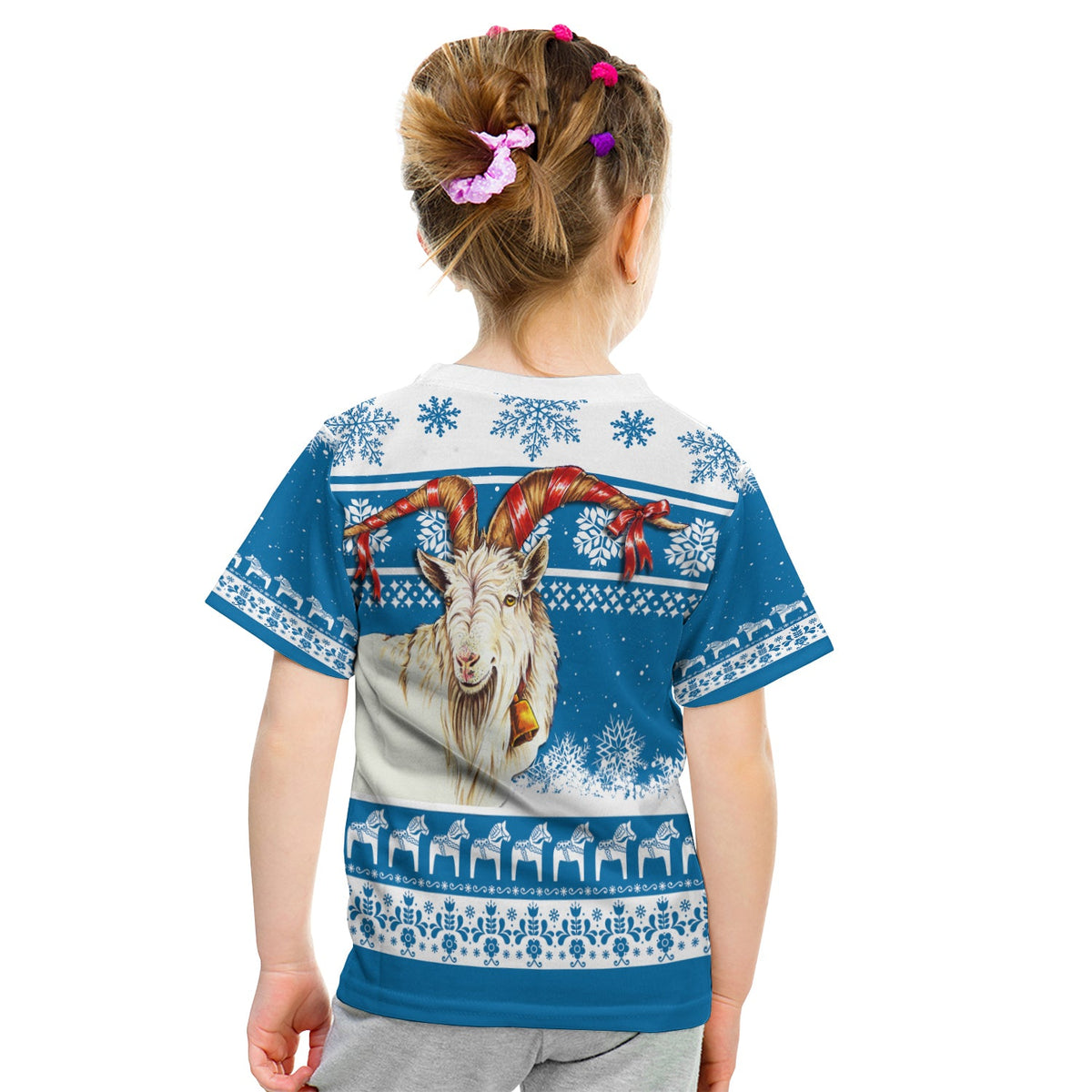 Blue kid's Christmas T-shirt back with goat head, red bows, and striped Nordic snow pattern