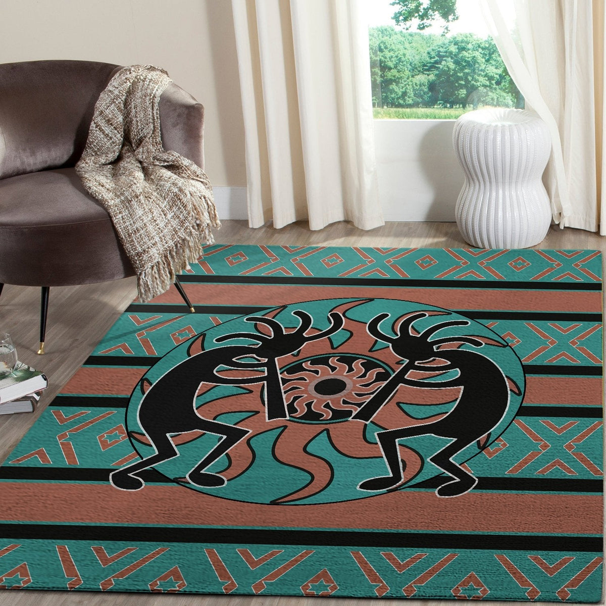 Close-up Kokopelli rug: teal and rust background with black figure and geometric banding