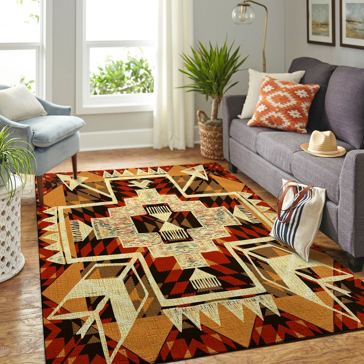 Tribal arrow area rug in warm orange-brown with cream geometric medallion and dark accents