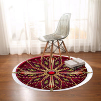 Red round carpet with central red medallion, long petal rays, multicolor beadwork, white edge
