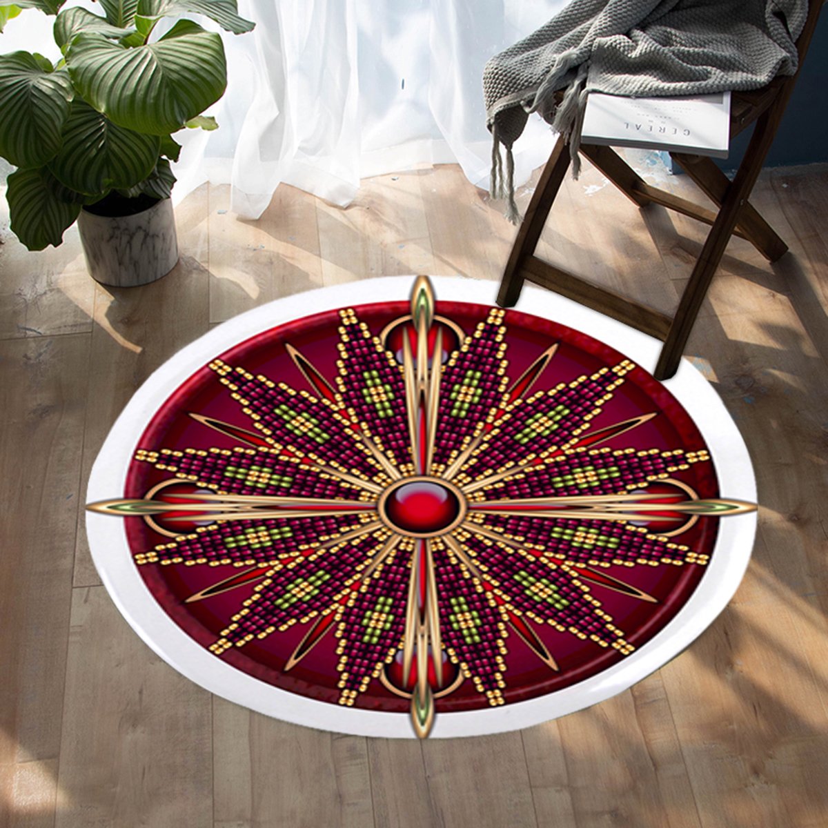 Red round carpet with ornate starburst wheel design, gold lines, beads, white rim