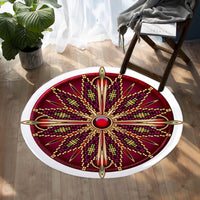 Red round carpet with ornate starburst wheel design, gold lines, beads, white rim