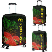 Black luggage cover with green leaf print, red ohia flowers and 'YOUR TEXT' lettering