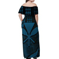 Off-shoulder maxi dress back view, dark and teal-blue geometric and tiki print