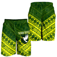 Pair of green tapa-pattern rugby shorts, elastic waist, 'YOUR TEXT' and bird print
