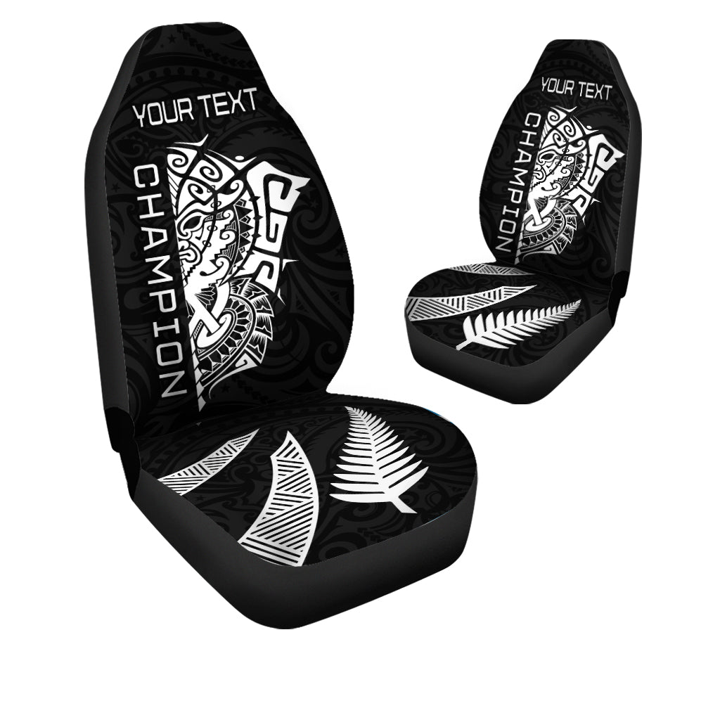 Black car seat covers with bold white tribal haka/ta moko artwork and custom text area