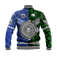 Two-tone green and blue baseball jacket back with large circular emblem, ribbed trim
