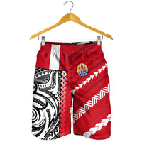 Men’s red swim shorts with white stripe panels, black tribal wave pattern, elastic waist