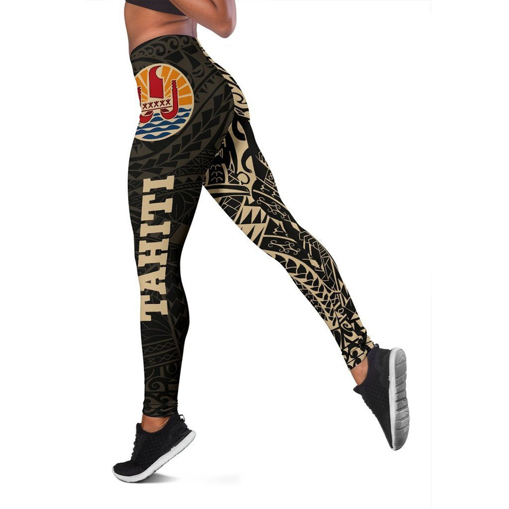 Black leggings with bold Polynesian-style graphics on the leg and thigh