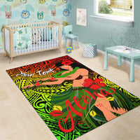 Rectangular hula girl rug with 'Aloha' lettering, green leaf swirls and red hibiscus flowers