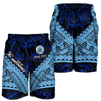 Men's blue patterned shorts with elastic waistband and circular badge on front