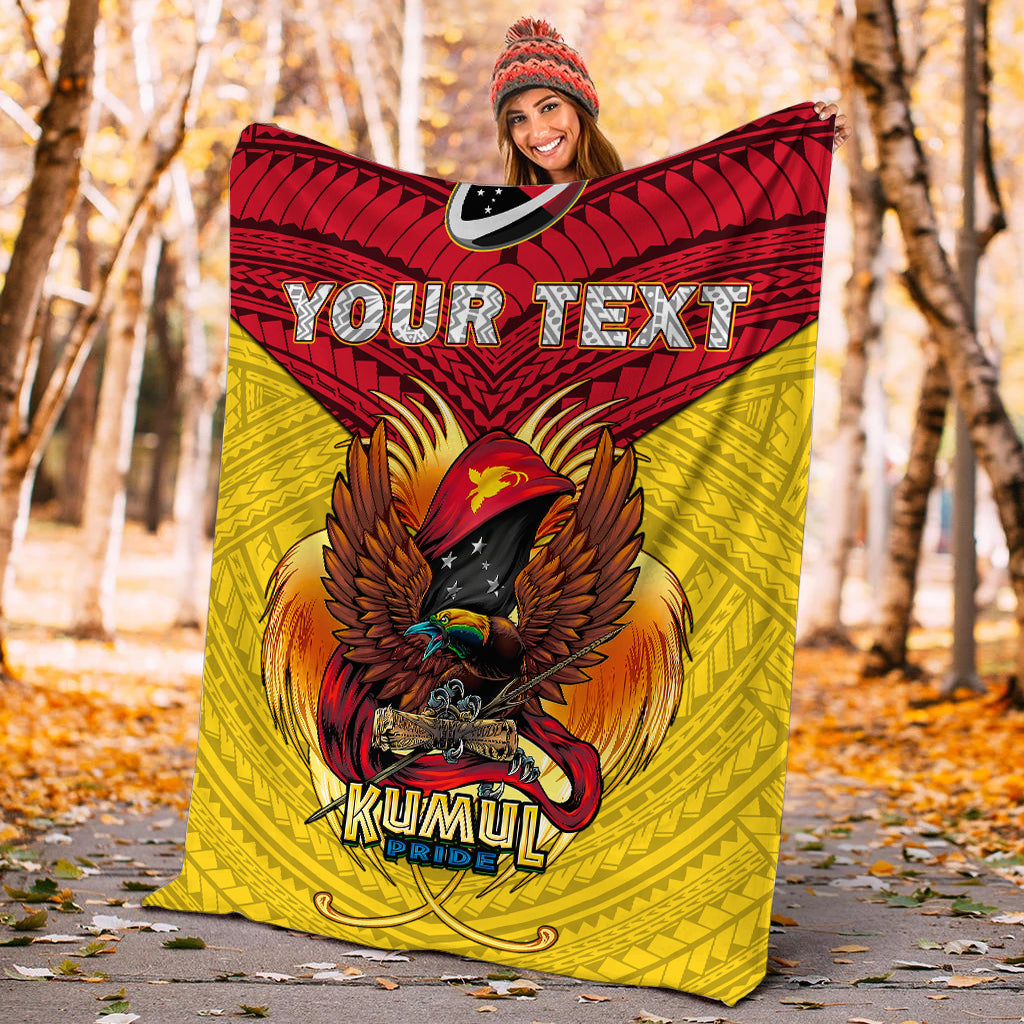 Red/yellow Kumul Pride blanket with eagle crest and 'Your Text' personalization, outdoors