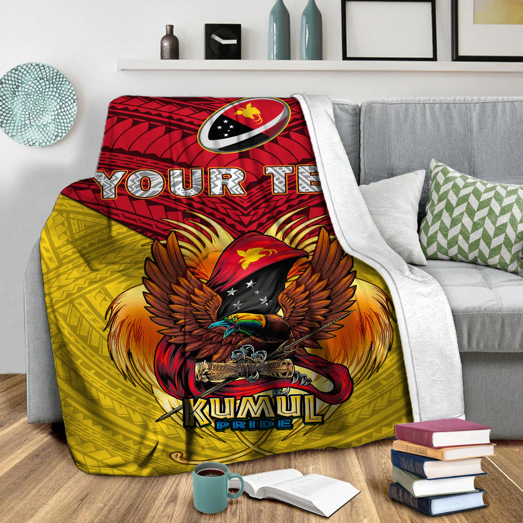 Red/yellow blanket draped on sofa, showing eagle graphic and 'Your Text' banner