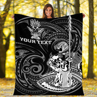 Black Hawaii warrior blanket with white tribal artwork and “YOUR TEXT” held outdoors