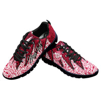 Maroon and white patterned football sneakers with black laces and black outsole