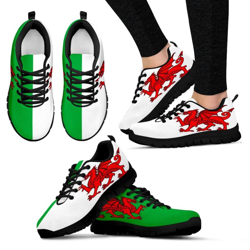 Unisex sneakers with Welsh dragon print, green accents, white upper, black rubber sole
