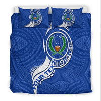 Pohnpei bedding set, blue duvet with two pillows featuring Micronesia Pride emblem