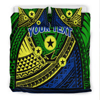 Green tribal bedding set with star icons, 'Your Text' on duvet, and two pillowcases