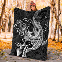 Black Polynesian shark tattoo blanket held outdoors with white tribal shark artwork