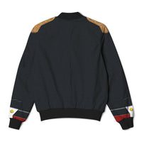 Black bomber jacket with gold shoulder panels and red-striped cuffs and hem
