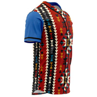 Angled view of colorful geometric jersey with red body and cream/black patterned front