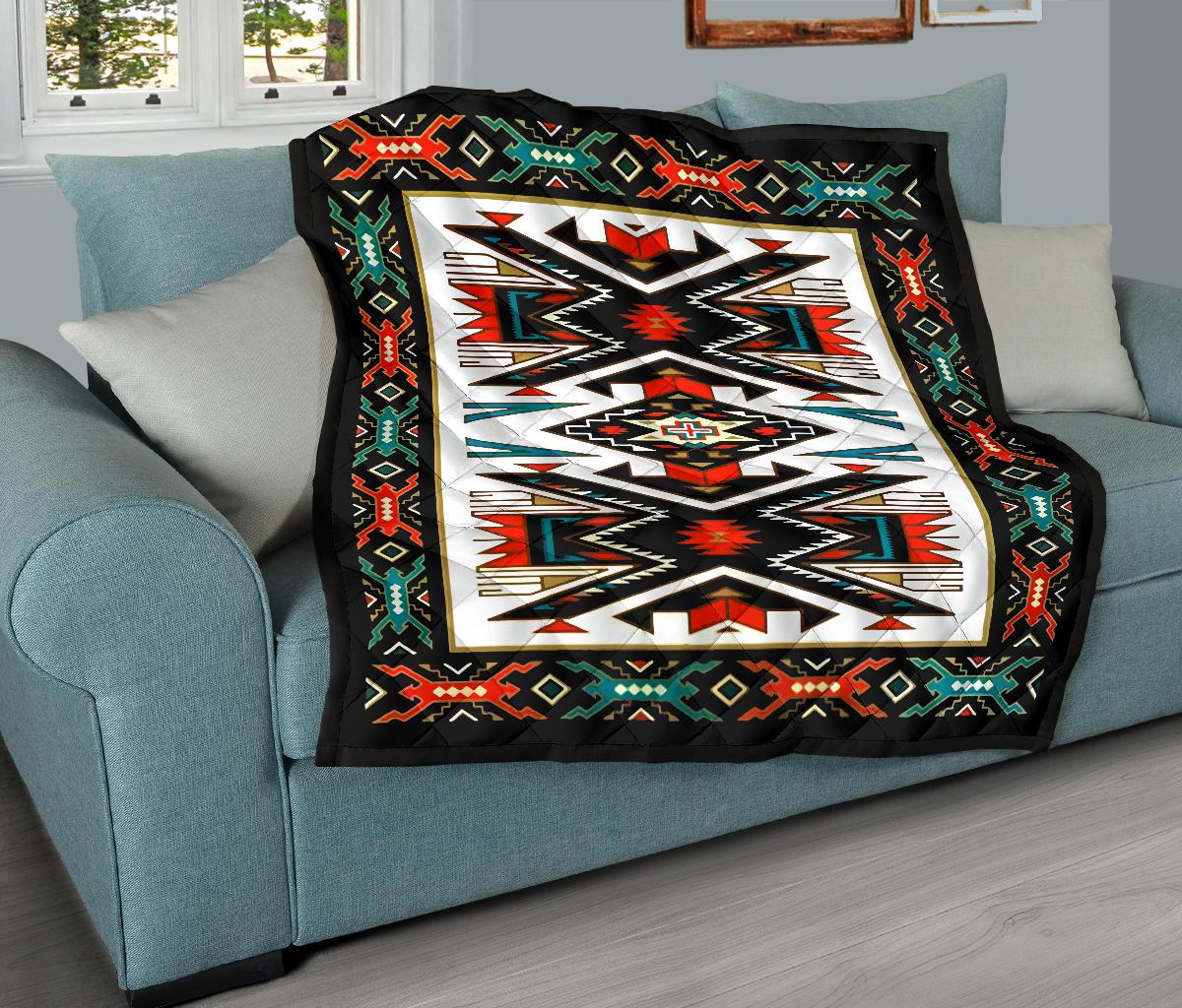 Native American style quilt with black border and multicolor geometric patterns