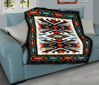 Native American style quilt with black border and multicolor geometric patterns