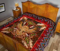 Red multicolor mandala quilt with geometric border and central bird-like pattern