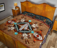 Brown mandala quilt with turquoise bead starburst and multicolor geometric accents
