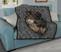 Premium quilt with swirling black-and-gray pattern and bold wolf face print