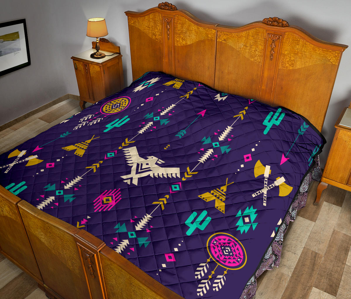 Premium quilt, deep blue with Native-style geometric multicolor pattern, close-up