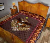 Native American eagle quilt, maroon center with turquoise accents and diamond pattern trim