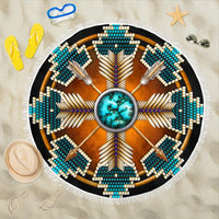 Round beach blanket with blue mandala beadwork, central turquoise medallion, white fringe
