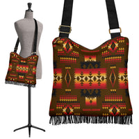 Multicolor boho crossbody bag with Native pattern, fringe hem, and adjustable strap