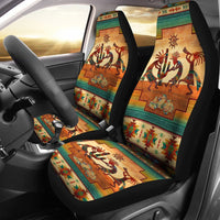 Car seat cover set with multicolor Kokopelli totem-style figures on front seats