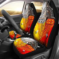 Multicolor Native American style seat covers with geometric wheel patterns on front seats