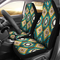 Turquoise car seat covers with geometric zigzag and diamond pattern on front seats