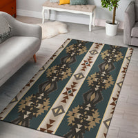 Geometric area rug with teal ground, tan and brown tribal motifs, central striped runner