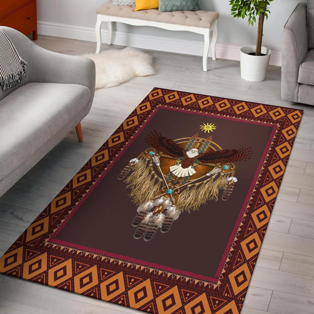 Native-style dreamcatcher area rug with owl figure, brown center, geometric border