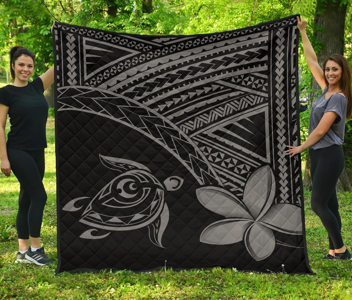 Grey Hawaiian quilt with black base, turtle and plumeria floral print, geometric border