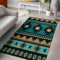Green and teal Aztec-pattern area rug with geometric diamonds and black border detail