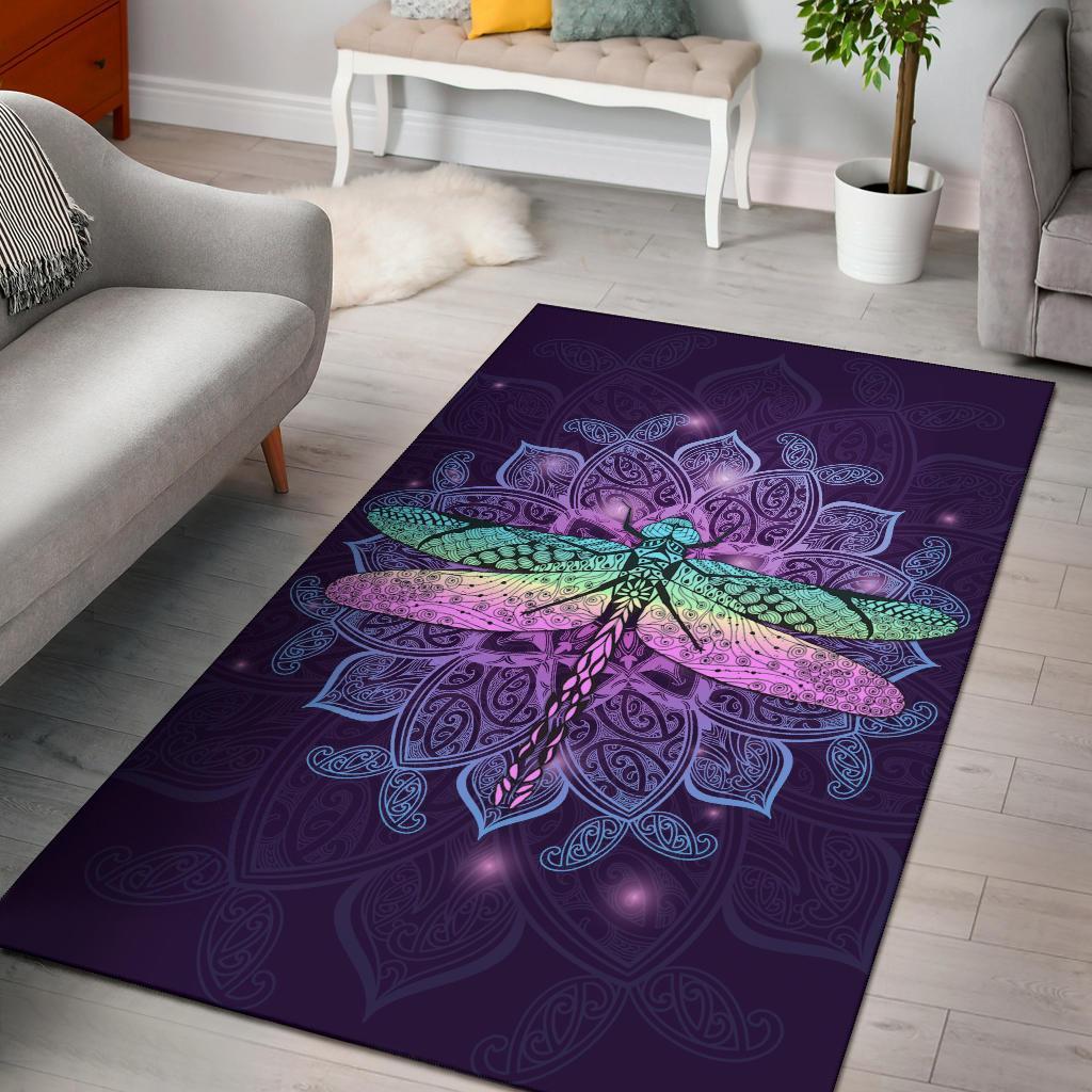 Purple area rug with ornate dragonfly mandala medallion design, vibrant teal and pink
