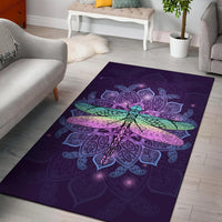 Purple area rug with ornate dragonfly mandala medallion design, vibrant teal and pink