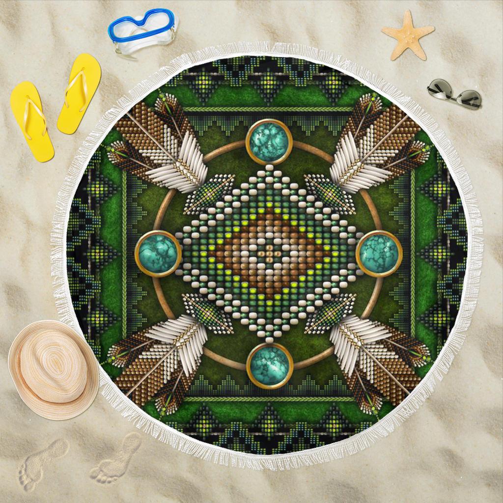 Green round beach blanket with white fringe, mandala Native American bead and cross-feather design
