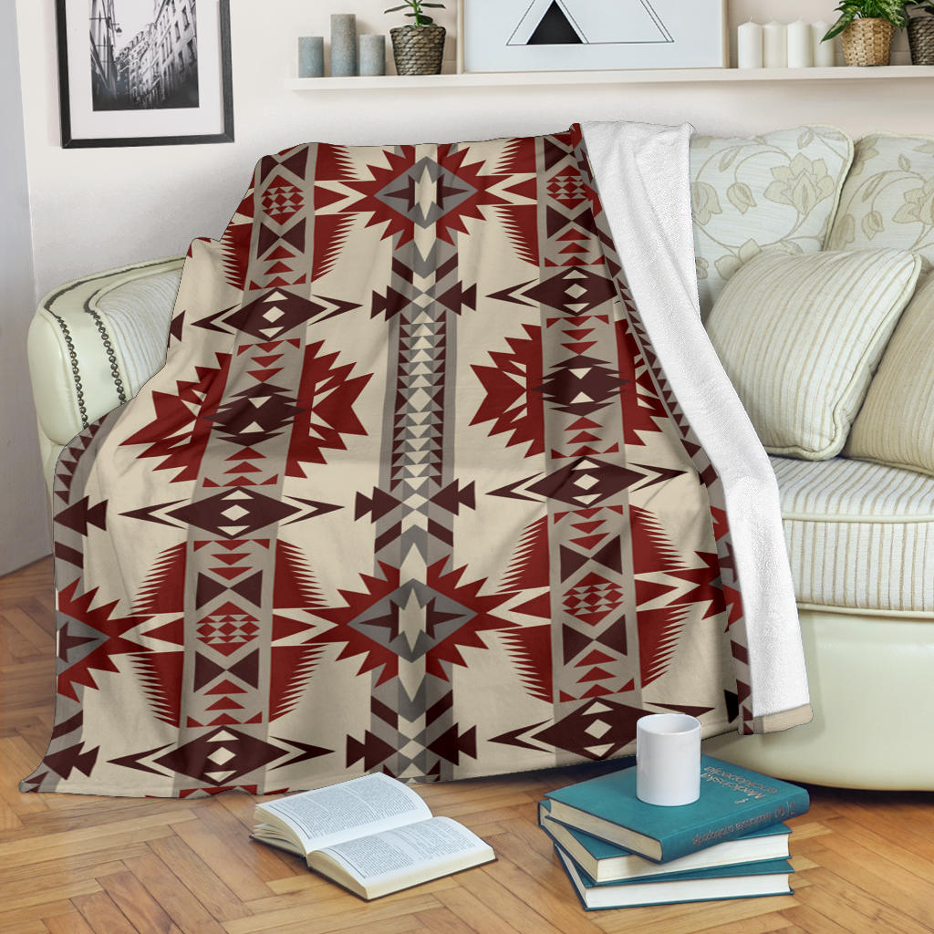Red, gray, and cream geometric star pattern premium blanket with patterned border