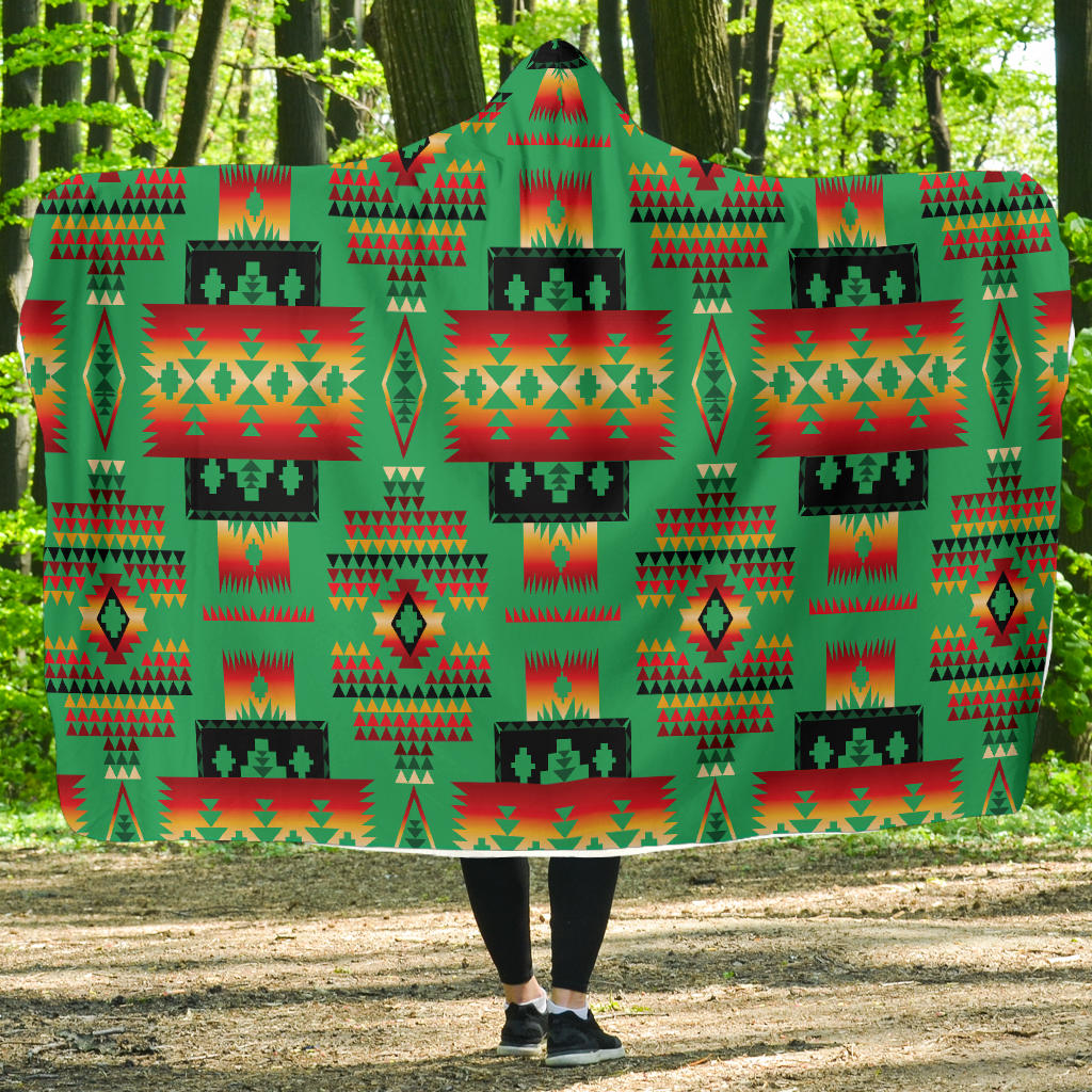 Green hooded blanket with multicolor Native American geometric pattern, front view